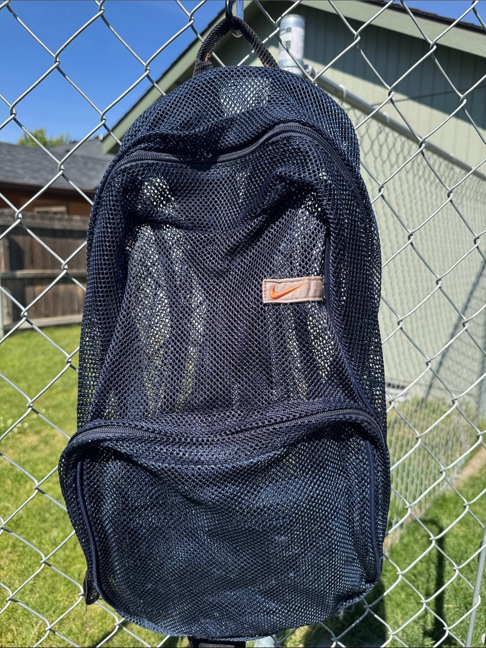 Vintage Nike Men’s Black Mesh Backpack with Orange Swoosh Patch